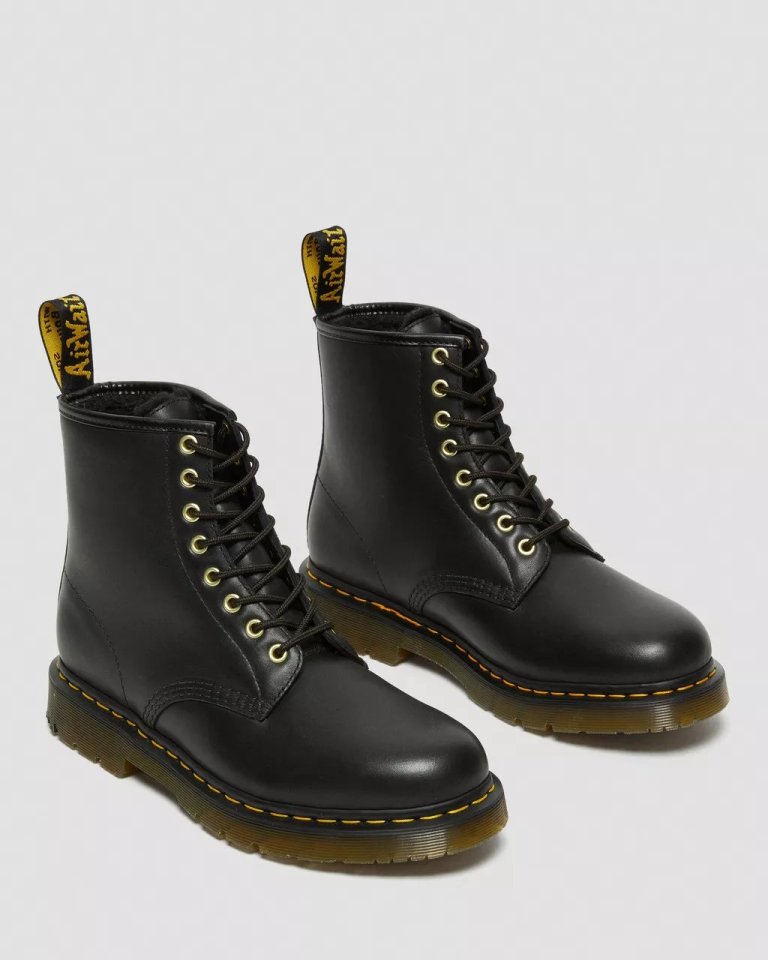 Pair of black Dr. Martens-style boots.