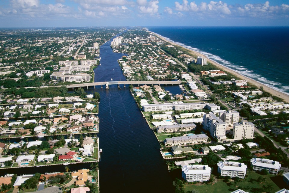 Aerial view of Florida coastline with residential areas and waterways.