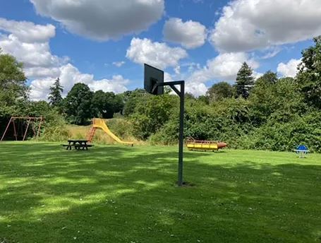 Playground with basketball hoop.