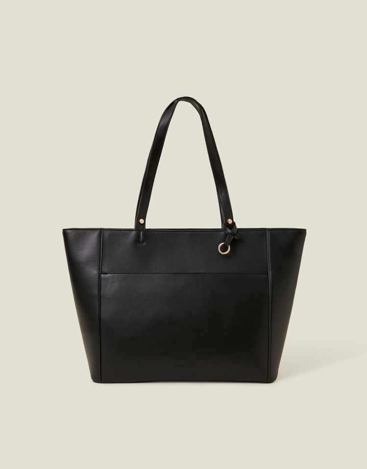 Black tote bag with gold accents.