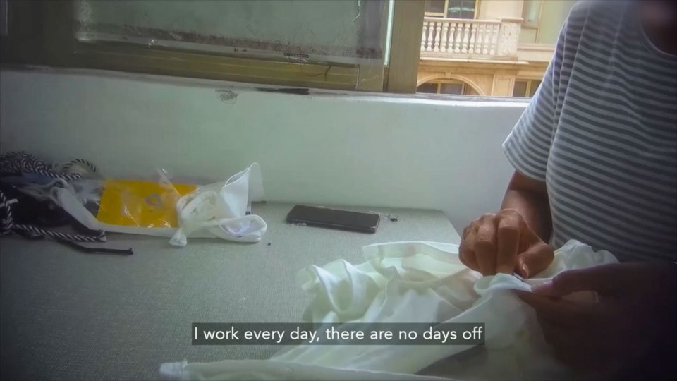 Person sewing a garment, text overlay reads "I work every day, there are no days off."