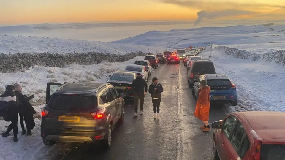 Hundreds of cars stuck in the snow.