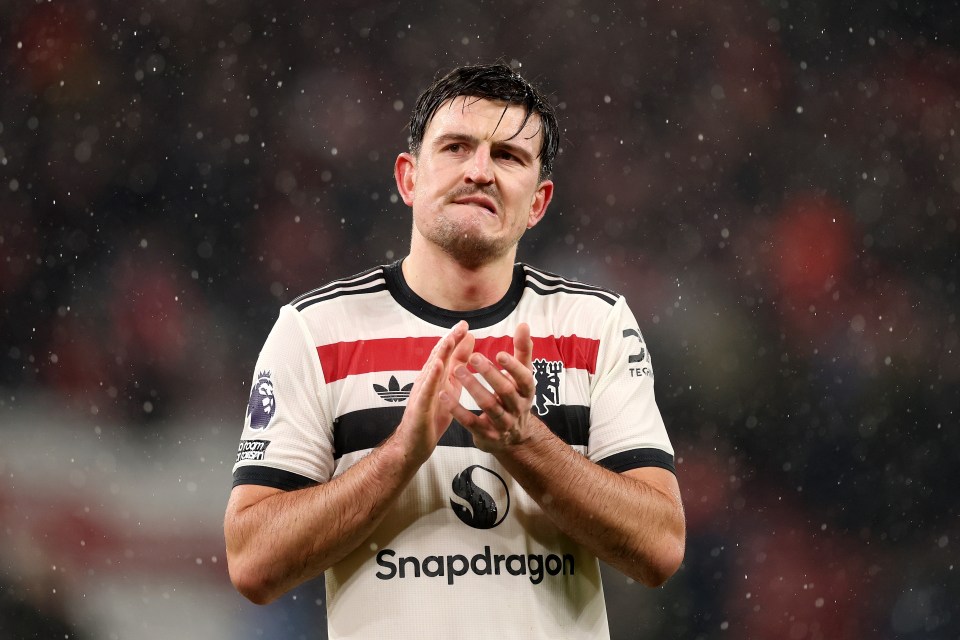 Harry Maguire of Manchester United applauding fans.