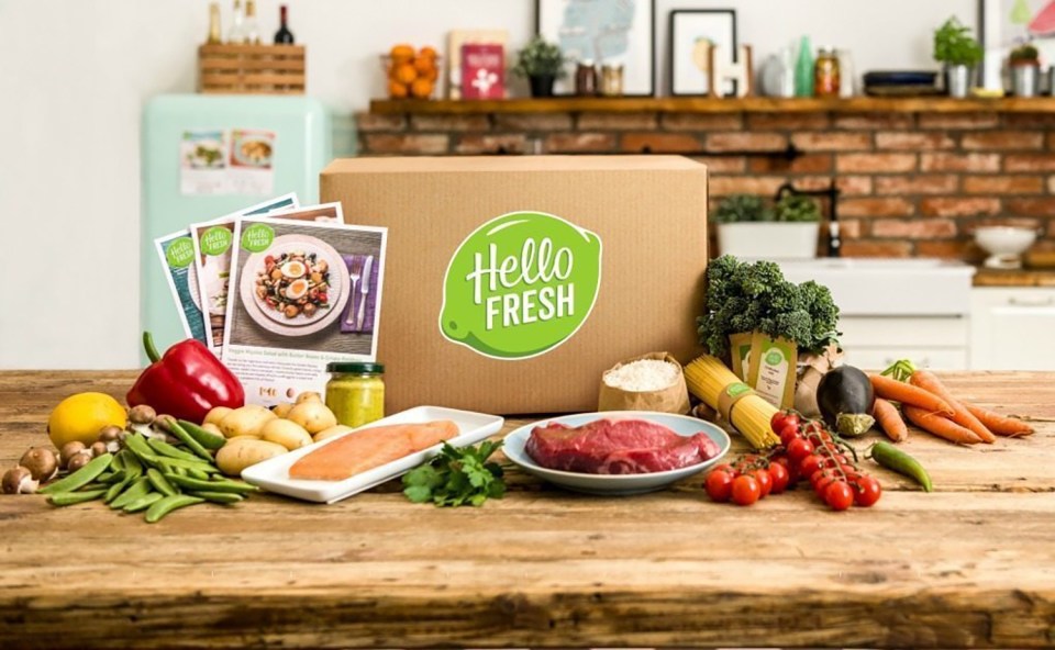 HelloFresh box with ingredients and recipe cards.