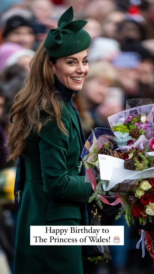 The Princess of Wales holding flowers.