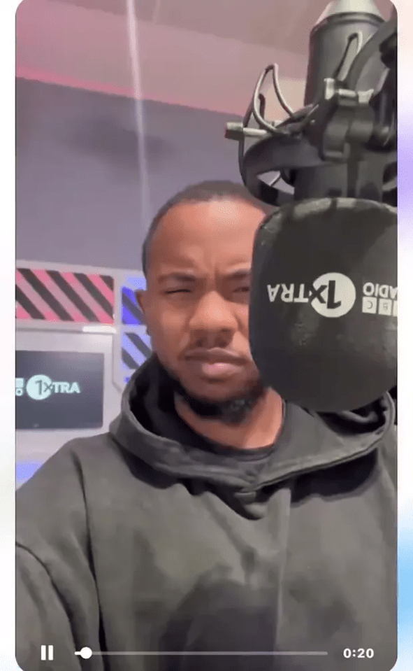 Man recording himself in a BBC 1Xtra studio.