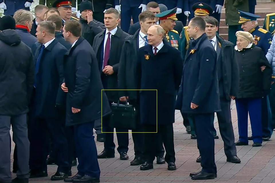 Vladimir Putin and his entourage.