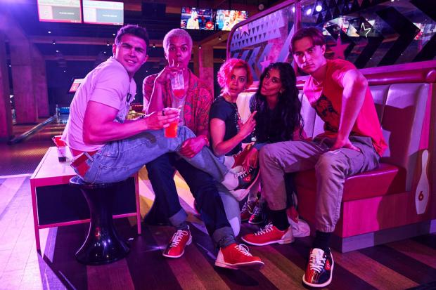 Group of friends at a bowling alley.