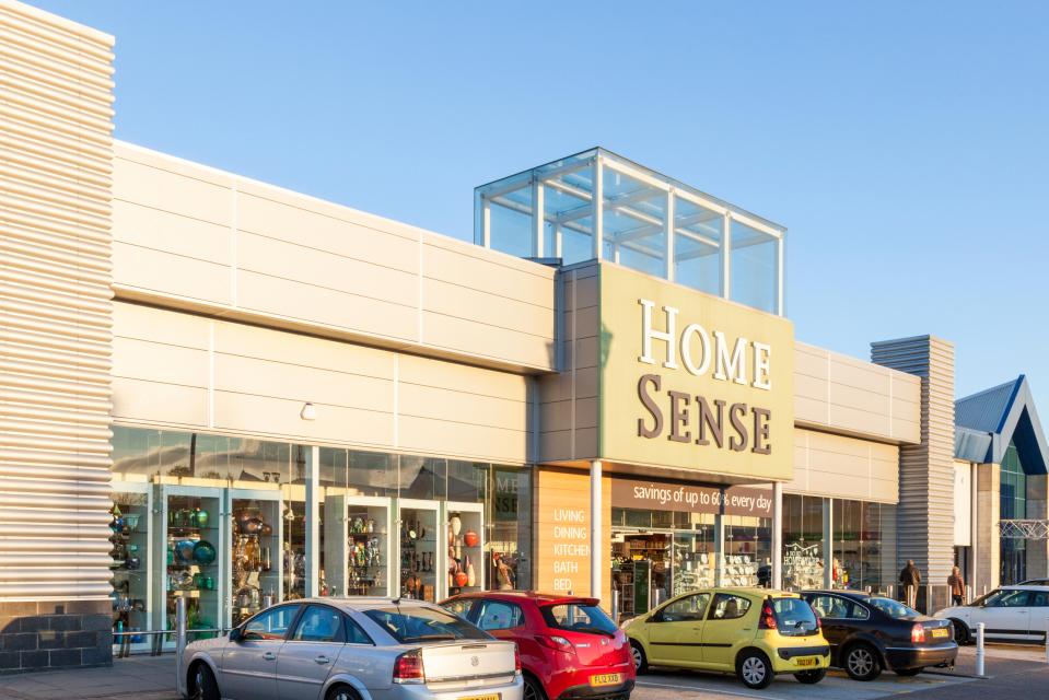 Home Sense store exterior with cars parked in front.