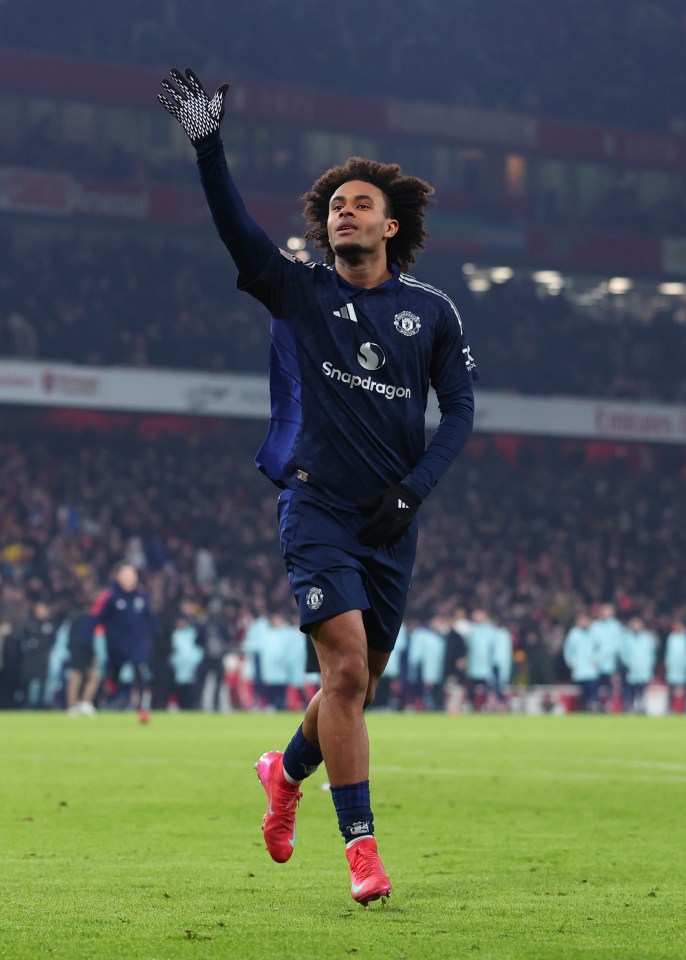 Joshua Zirkzee of Manchester United celebrates scoring a winning penalty.