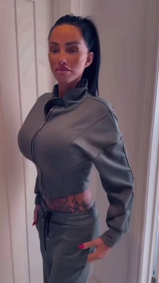 Katie Price in a video showing a slim figure in an olive green tracksuit.