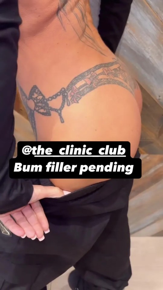 Person's lower back with a tattoo and text overlay: "Bum filler pending."