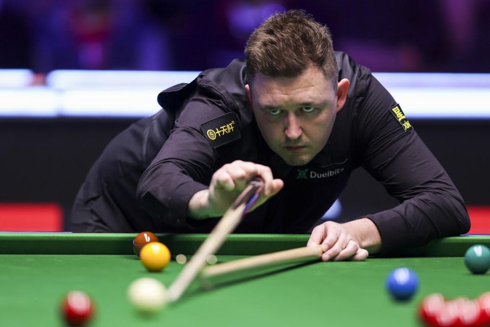 Kyren Wilson of England playing snooker.