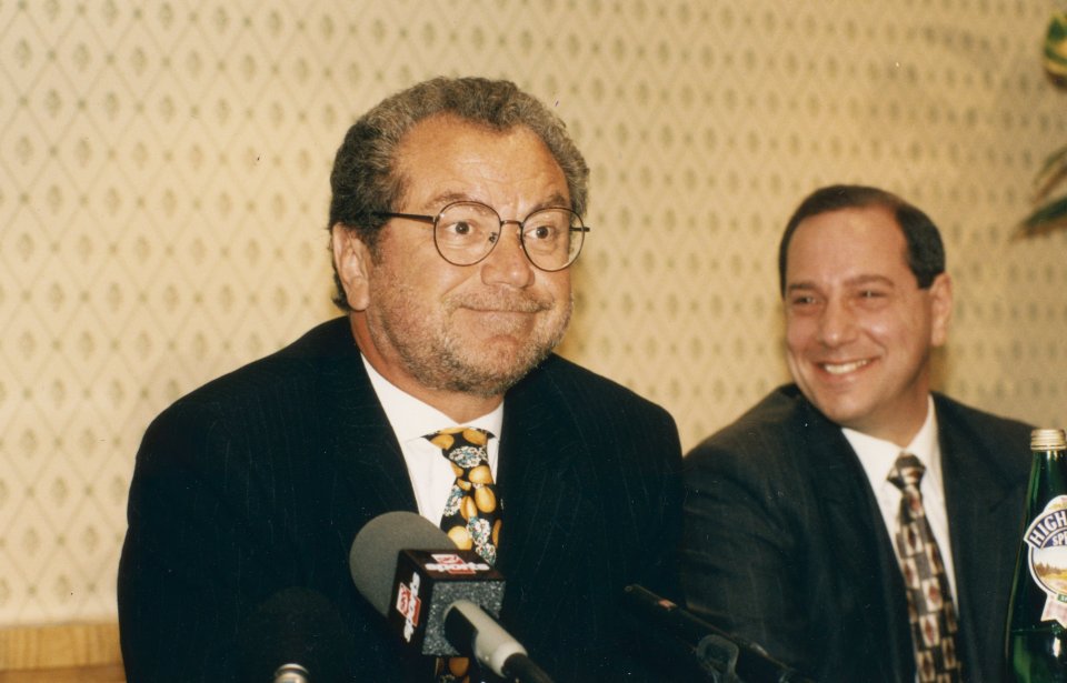 Alan Sugar and Claude Littner at a press conference.