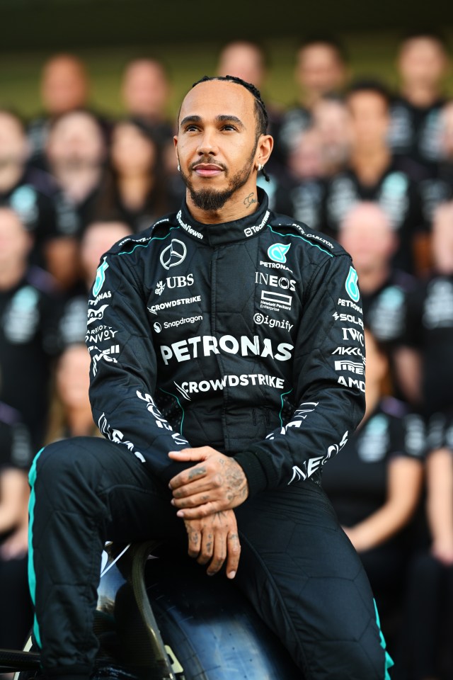 Lewis Hamilton in Mercedes team attire.