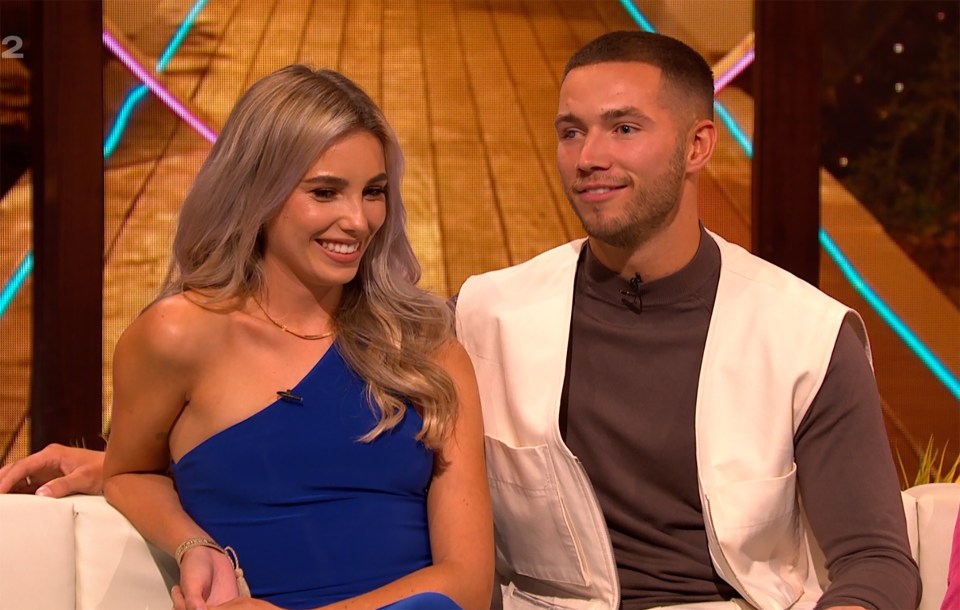 Love Island reunion: a couple sitting together.