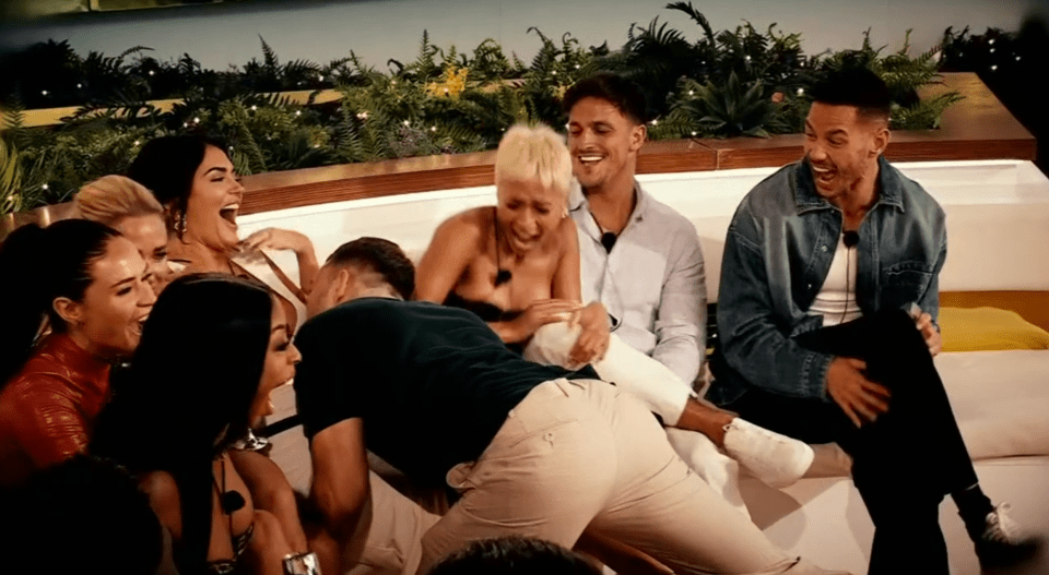 Love Island All Stars cast reacting to a steamy episode.