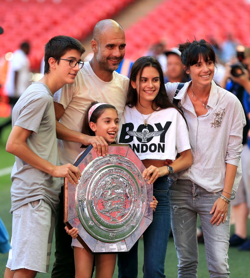 Josep Guardiola with his family and the Community Shield trophy.