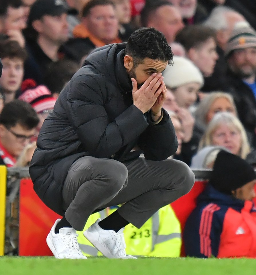 Manchester United manager Ruben Amorim with his hands on his face.