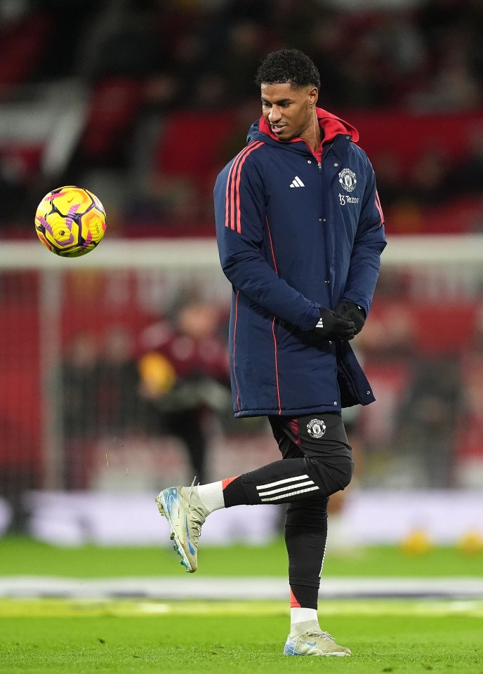 Marcus Rashford warming up before a Manchester United match.