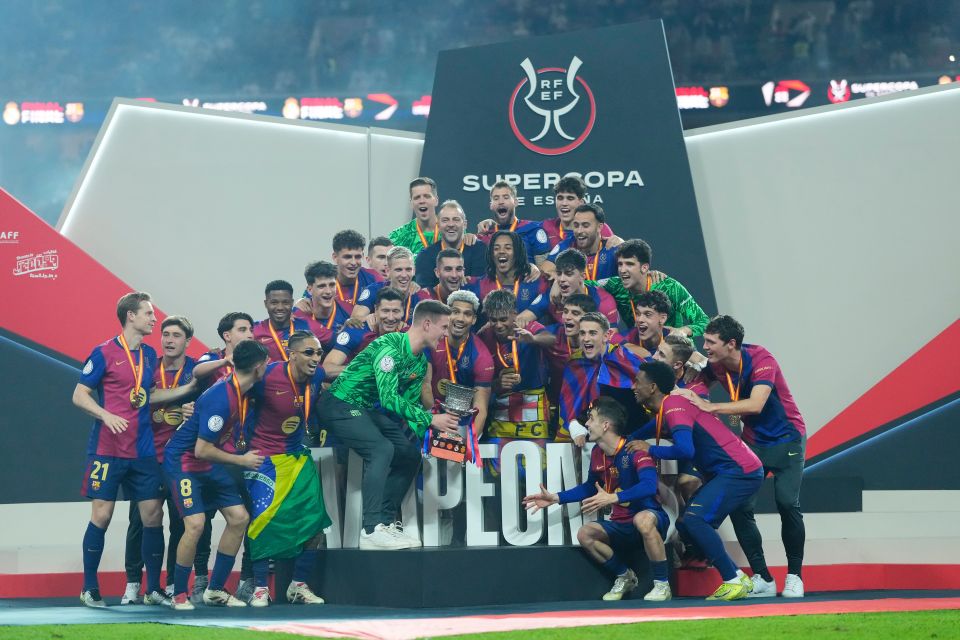 FC Barcelona team celebrating Spanish Super Cup victory.