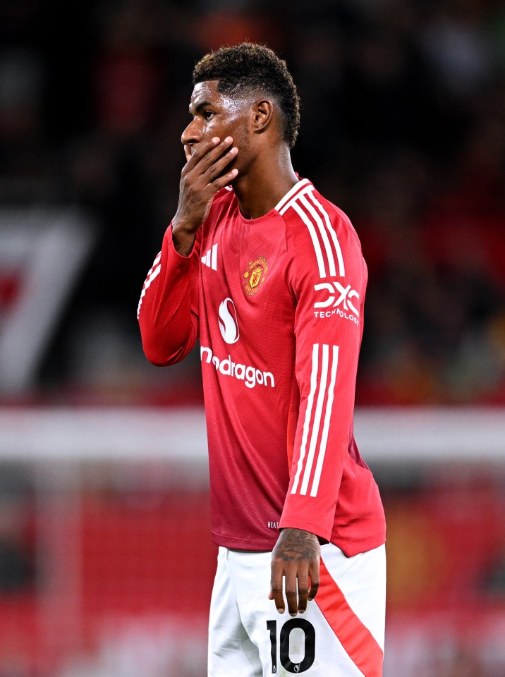 Marcus Rashford of Manchester United reacting during a soccer match.