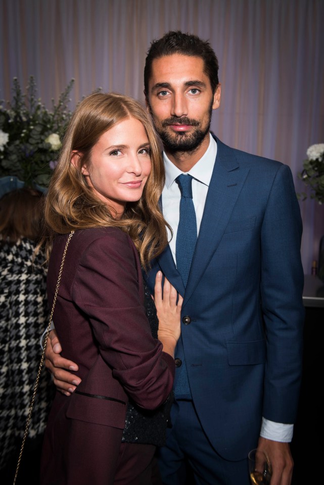 Millie Mackintosh and Hugo Taylor at a party.