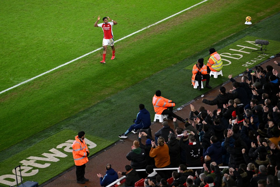 Arsenal's Myles Lewis-Skelly acknowledges fans after being substituted.