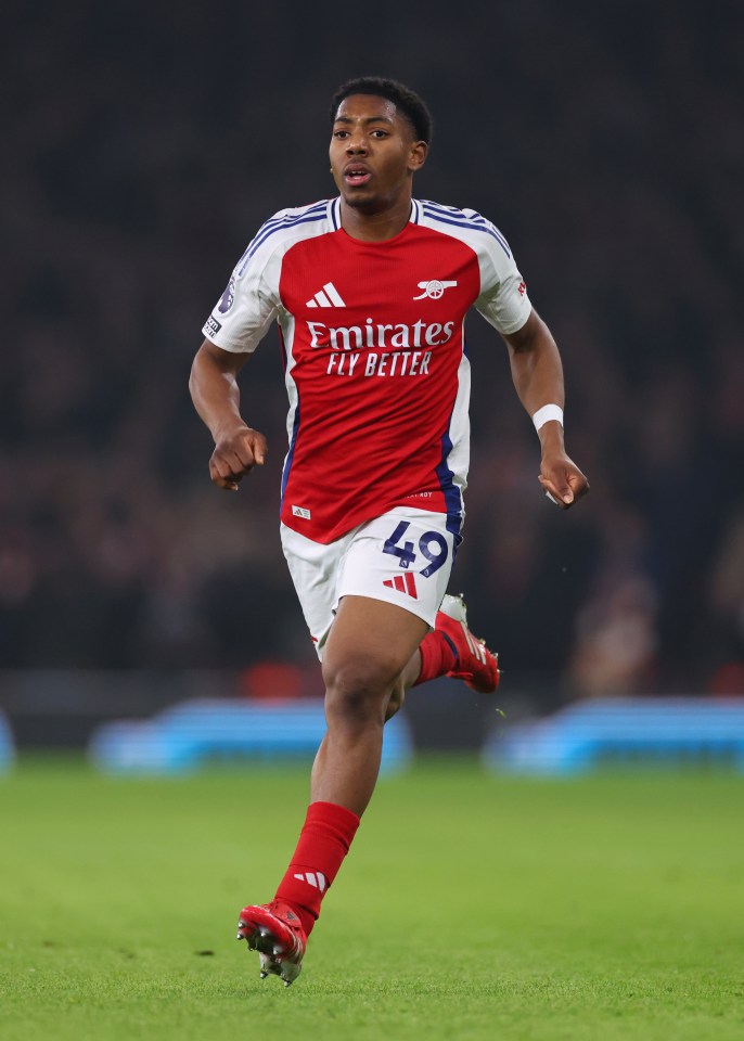 Myles Lewis-Skelly, Arsenal player, running on the pitch.