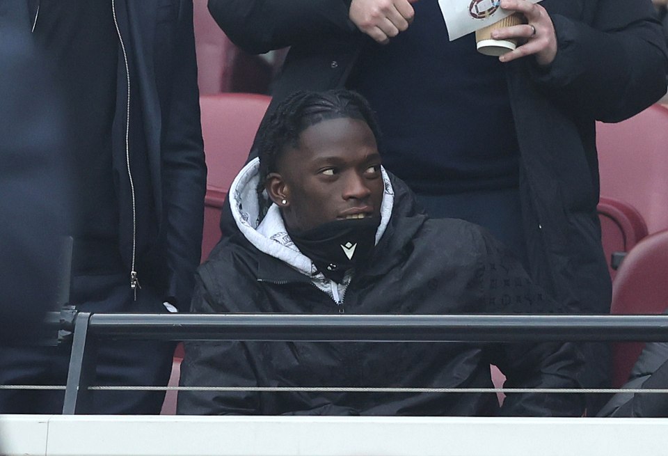 Romain Esse, new Crystal Palace signing, watches a Premier League match.