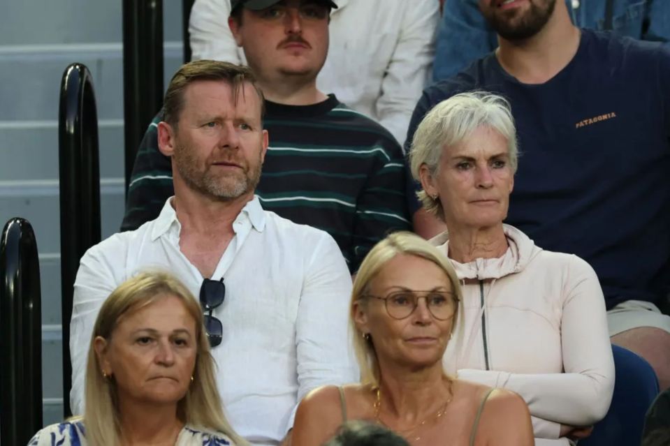 Judy, Andy's mother, watching a match.