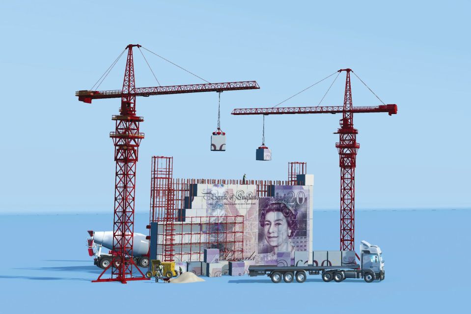 Construction cranes building a structure from twenty pound notes.