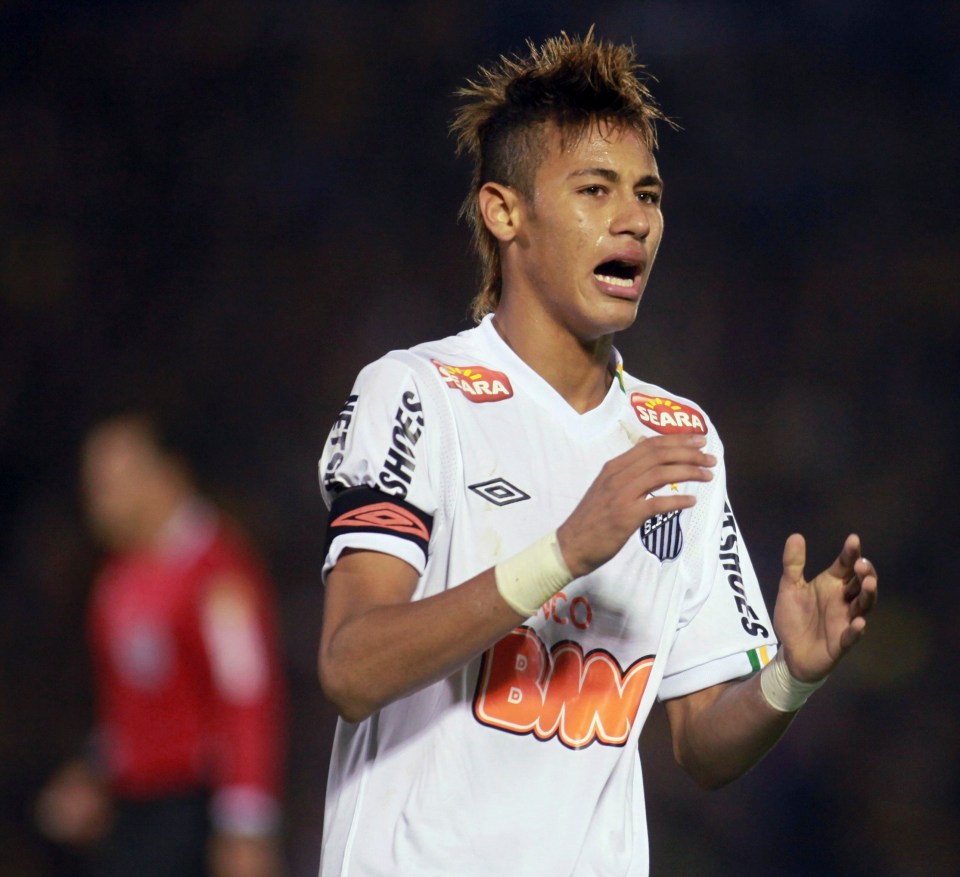 Neymar of Brazil's Santos reacts after missing a goal.