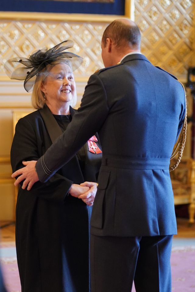 Pauline Quirke receives an MBE from the Prince of Wales at Windsor Castle.