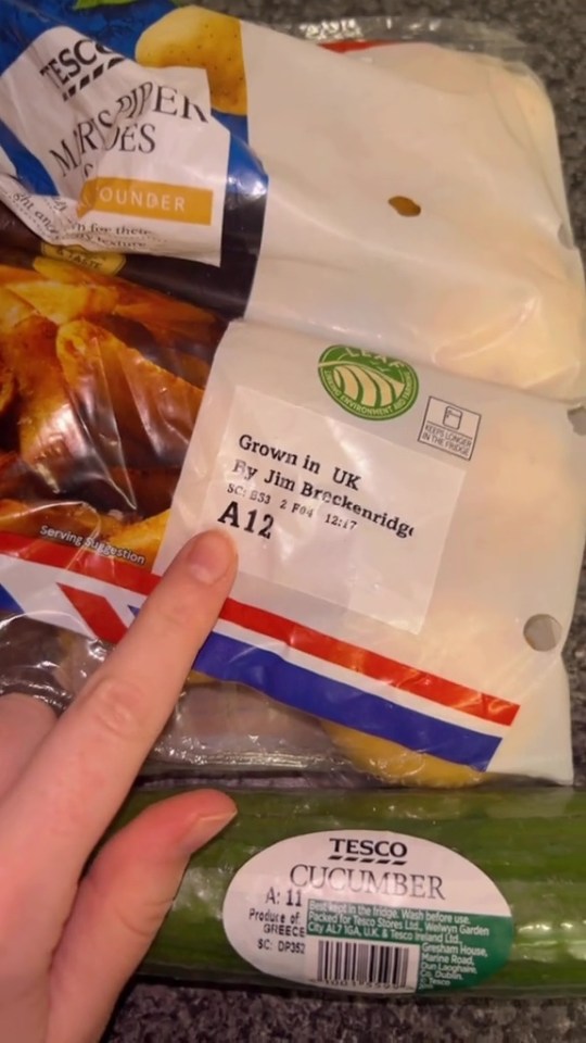 Tesco produce packaging labels showing codes indicating origin and farm.