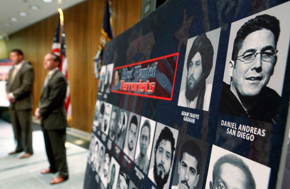 A photo of Daniel Andreas San Diego, top right, on a poster of the FBI’s most wanted terrorists during a news conference in 2009