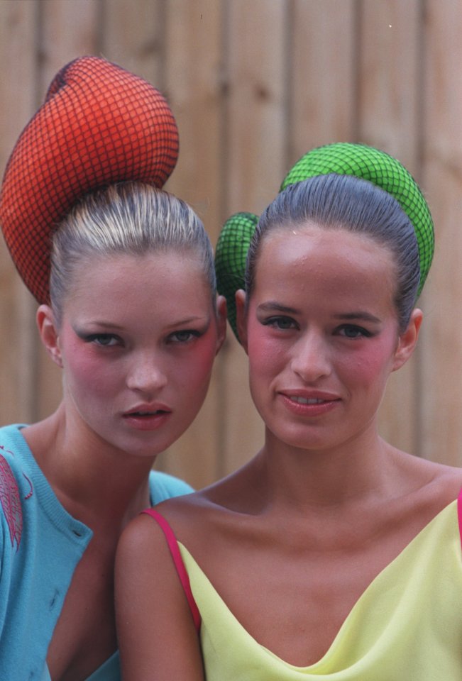 Kate Moss and Jade Jagger at a fashion show.