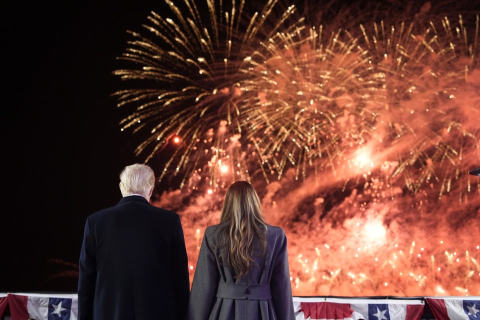 Donald and Melania Trump watching fireworks.