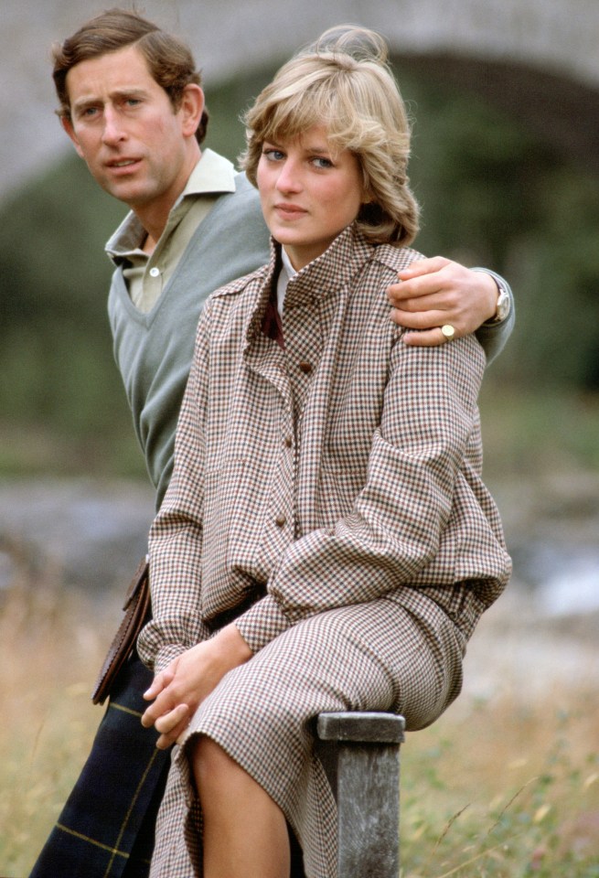 Prince Charles with his arm around Princess Diana during their honeymoon.