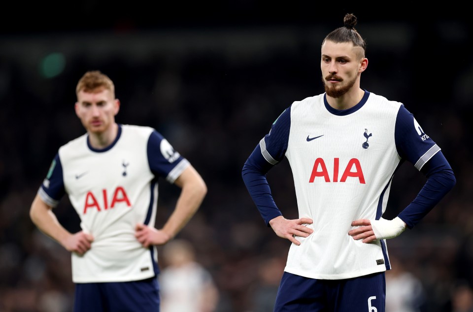 Radu Dragusin of Tottenham Hotspur looking dejected during a match.