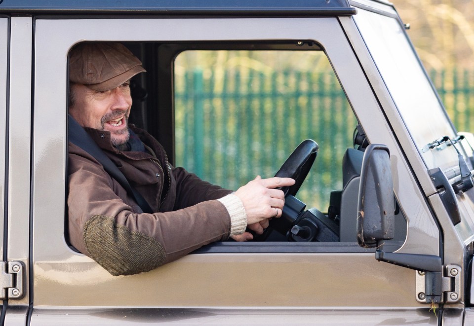 Richard Hammond driving a Land Rover.