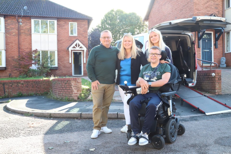 Family in front of their house.