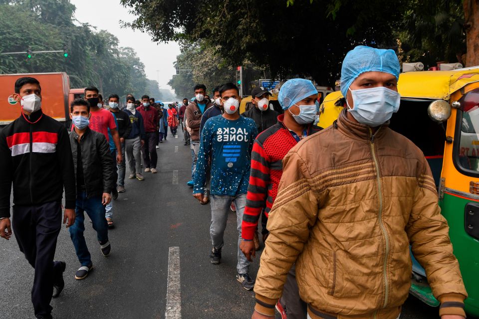 People wearing facemasks participated in a walkathon to raise awareness of Covid in New Delhi in November 2020