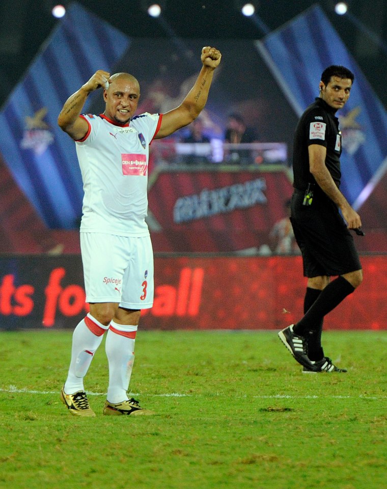 Roberto Carlos of Delhi Dynamos FC celebrating during a soccer match.