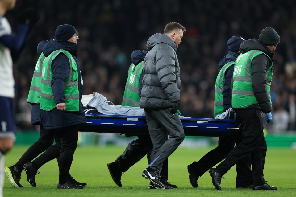 The midfielder was carried off after a delay of around eight minutes