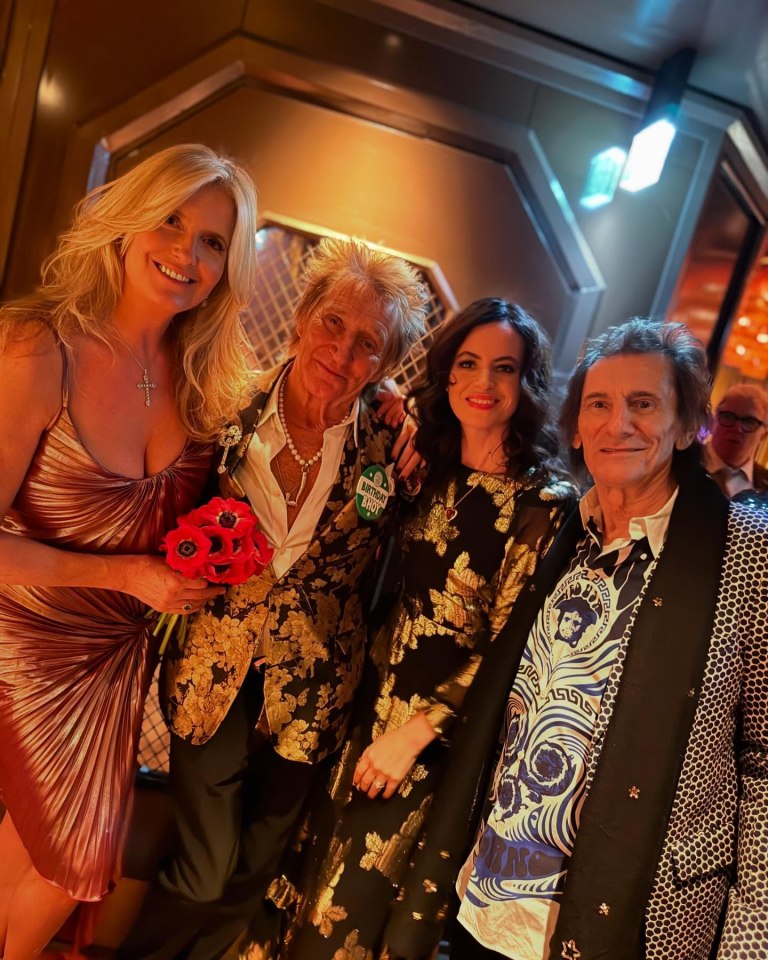 Rod Stewart, Ronnie Wood, and two women at a birthday celebration.