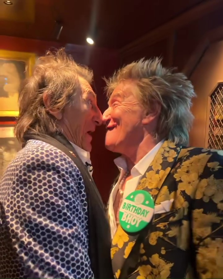 Rod Stewart and Ronnie Wood at a birthday celebration.