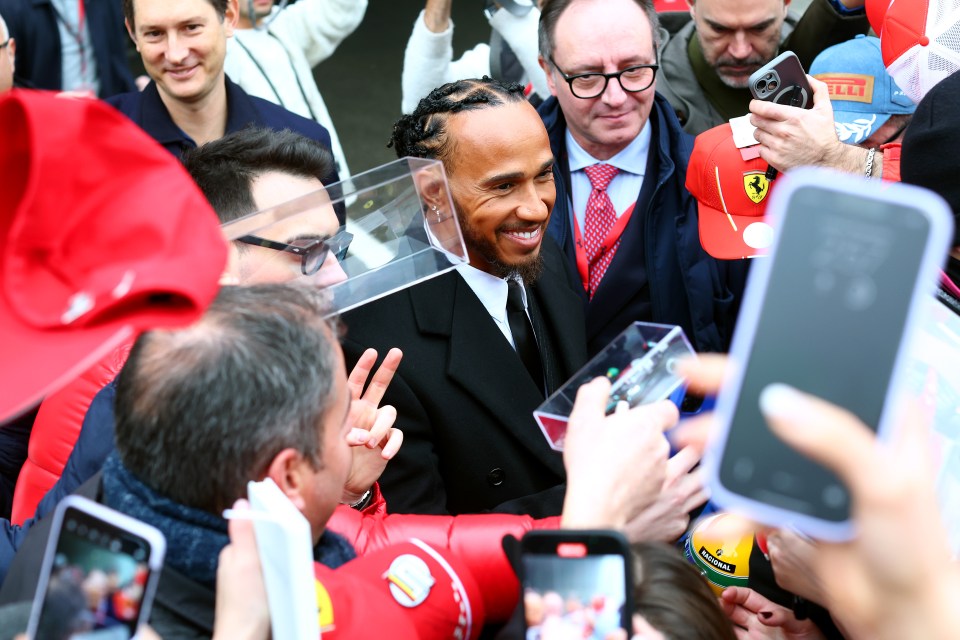 Lewis Hamilton greeting fans.