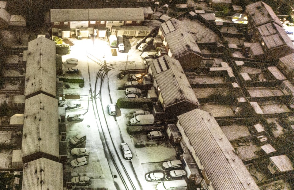 Snow covers the ground and houses in Peterborough, Cambridgeshire