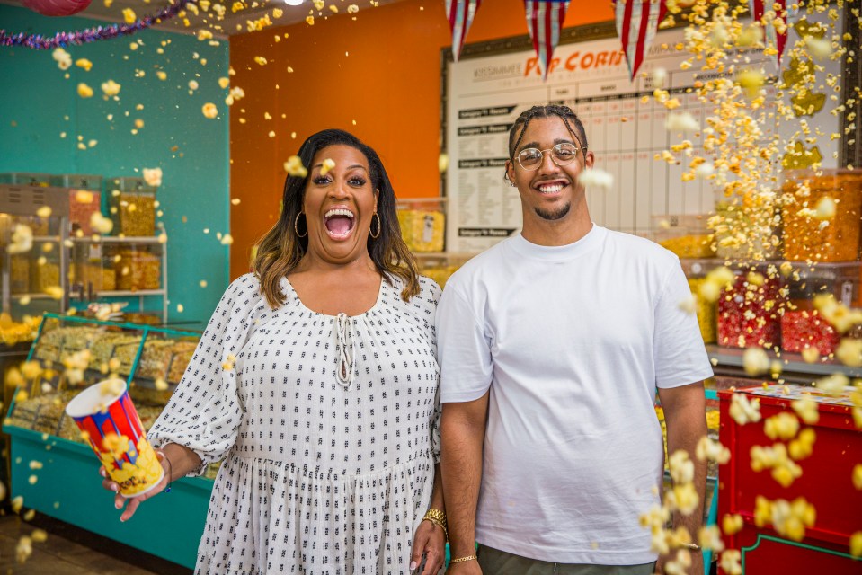 Alison Hammond and Aidan Hammond amidst a popcorn shower.